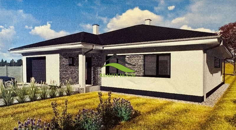 A family house in Dúbravka with stone cladding, a white facade, and a lawn in front of the house.