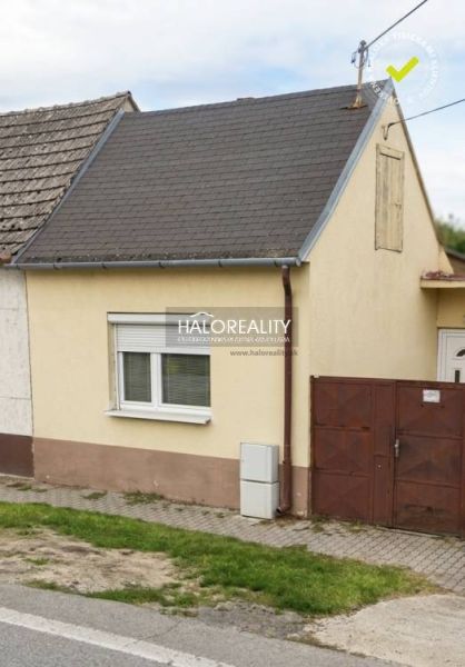 A family house in Malacky with a small front garden and a simple facade.