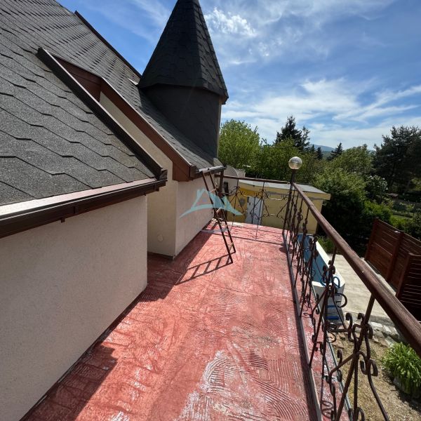 The terrace of the cottage on Agátová Street in Šahy with a view and decorative railing.