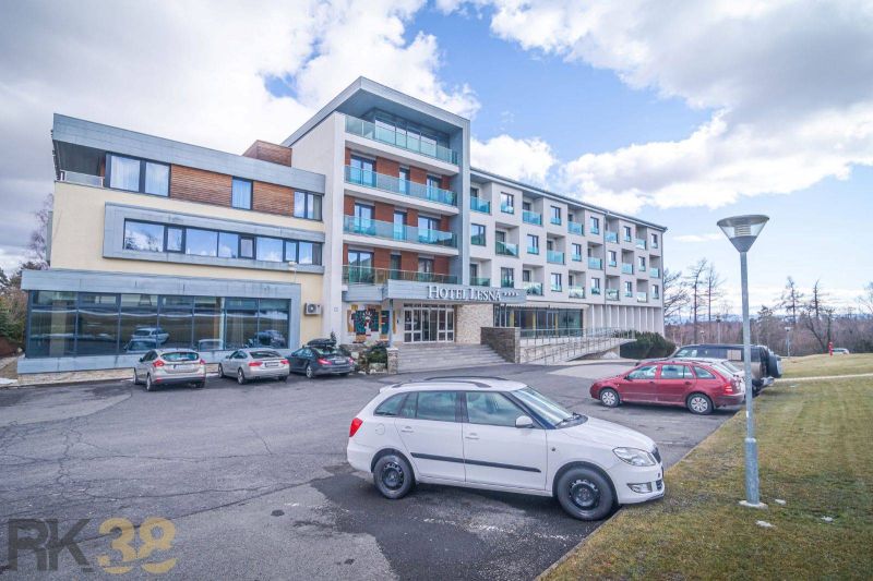 A recreational apartment in Stará Lesná with parking in front of the building and a beautiful scenery.