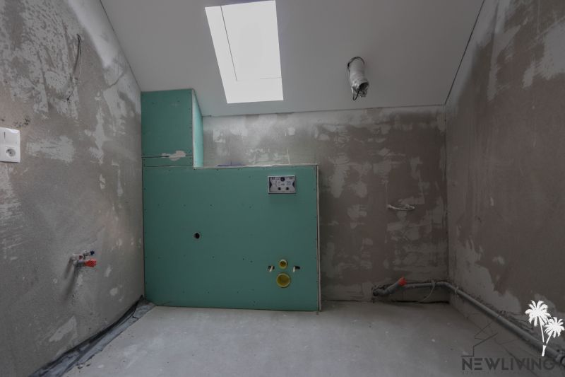Bathroom renovation in a 4-room apartment with drywall installation.