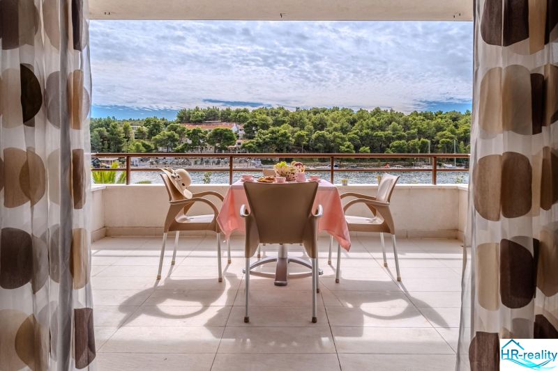 Brač Holiday Apartment with Terrace and View of the Sea and Greenery.