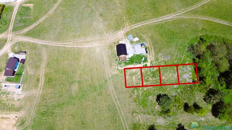 Aerial view of recreational plots in Nova Kelc with outlined parcels.
