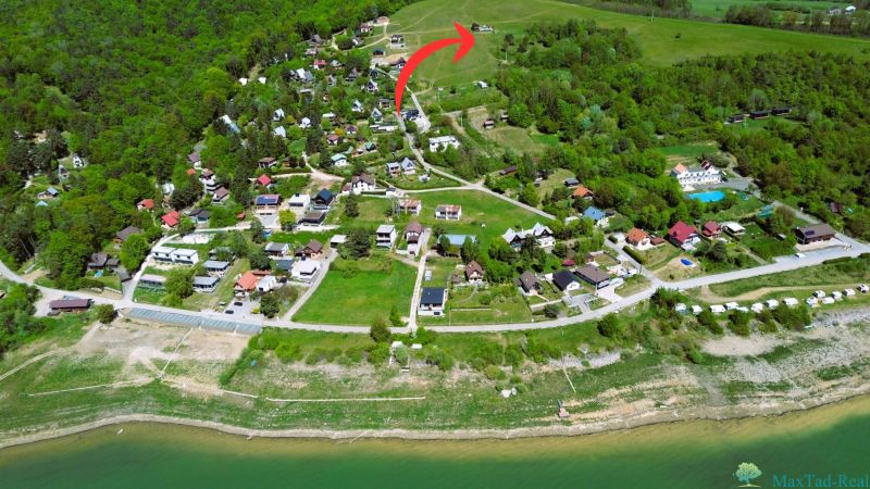 Aerial view of the cottage area near the water reservoir in Nova Kelc.