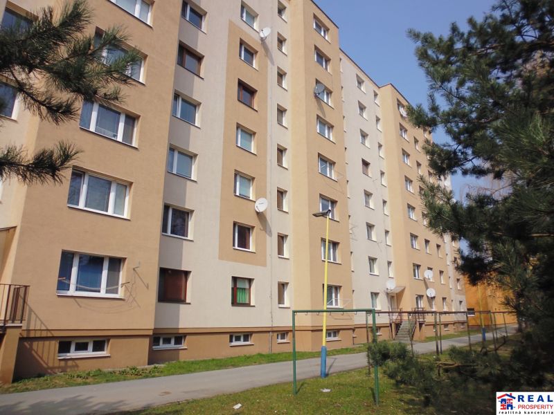 Apartment building on G. Svoboda Street in Prešov, surrounded by greenery and a walkway.