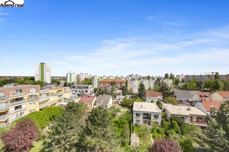 A view of apartment buildings and greenery in Bratislava - Vrakuňa on Kríkova Street.