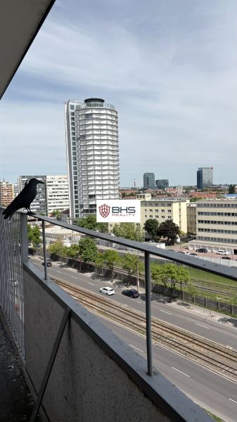 View from the balcony of a 2-room apartment on Račianska Street in BAIII with a panorama of the city.