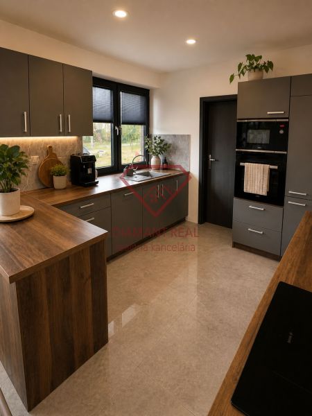 A kitchen in a family house with a floor and kitchen countertop with a wooden decor.