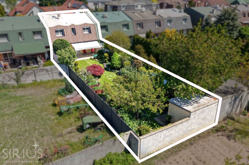 Aerial view of a family house on Hollého Street in Stupava with a landscaped garden.
