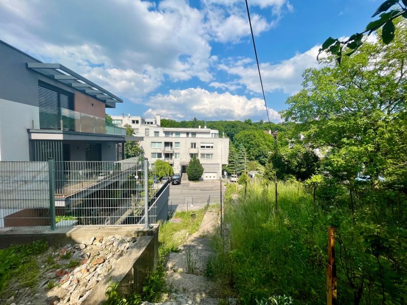 Búdková Street, Bratislava - Staré Mesto; green slope, new family house construction.