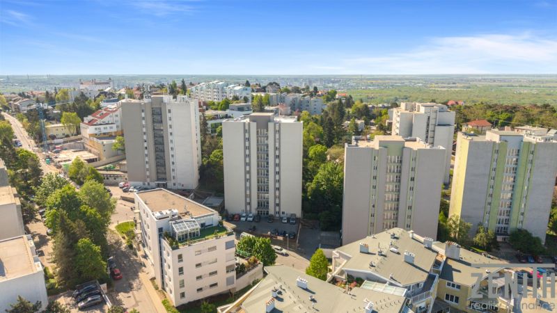 A view of residential buildings surrounded by greenery in Bratislava - Old Town.