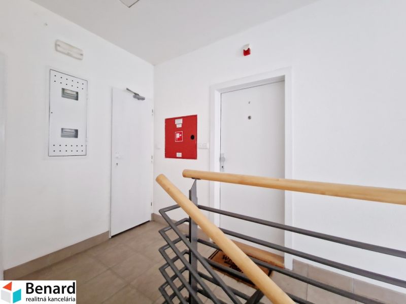 Entrance areas of a 3-room apartment with white doors and railings.