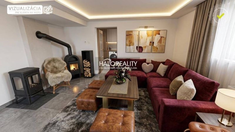 Living room in a family house with a fireplace, a burgundy sofa, and pleasant decorations.