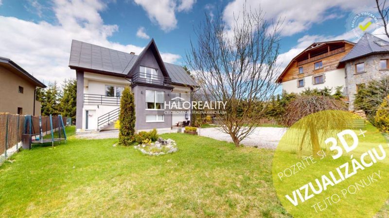 A family house in Vitanová with a nicely maintained garden and a view of the surrounding houses.