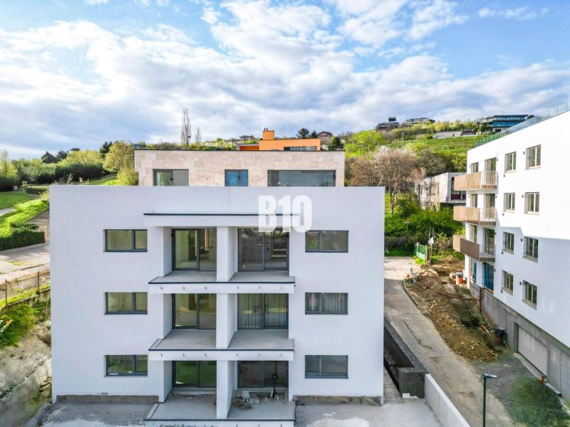 A new building with balconies, surrounded by greenery in Bratislava-Nové Mesto, offers 3-room apartments.