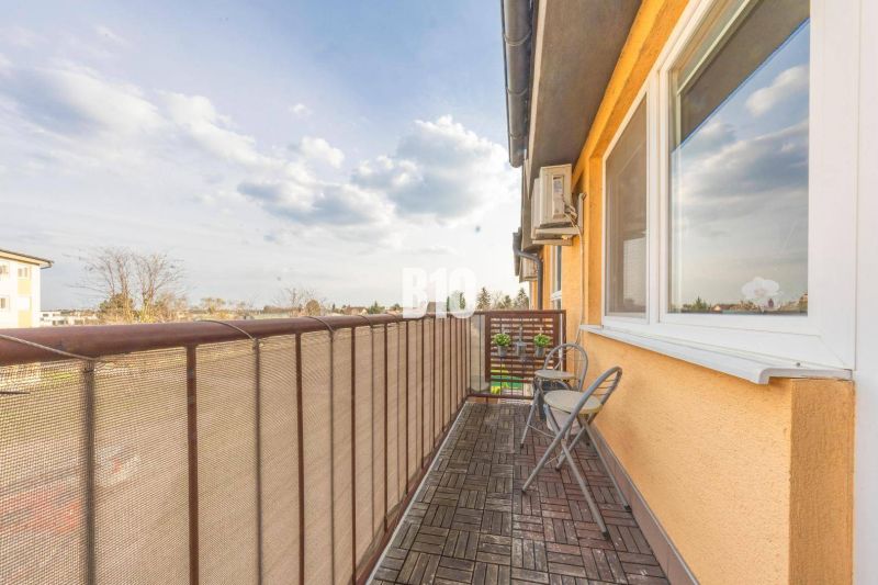 The balcony of a 2-room apartment with a view of M. R. Štefánik Street in Most pri Bratislave.