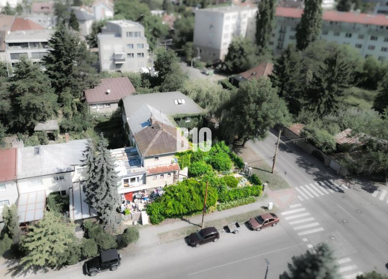 A family house in Bratislava - Staré Mesto surrounded by greenery, with an adjacent garden.