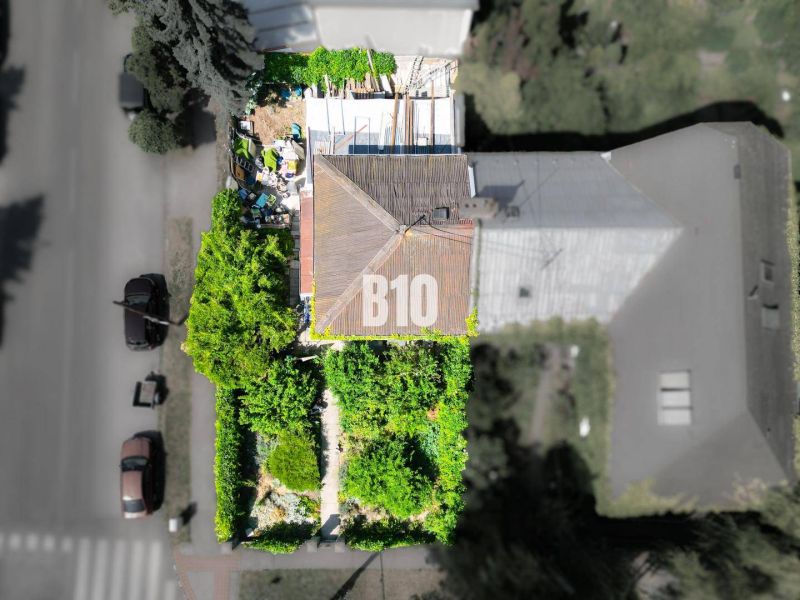 A family house in Bratislava - Old Town surrounded by greenery and a garden from a bird's eye view.