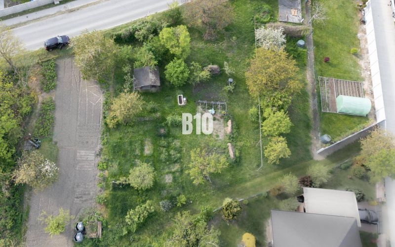 Aerial view of a green garden on a residential plot in Dunajská Lužná.
