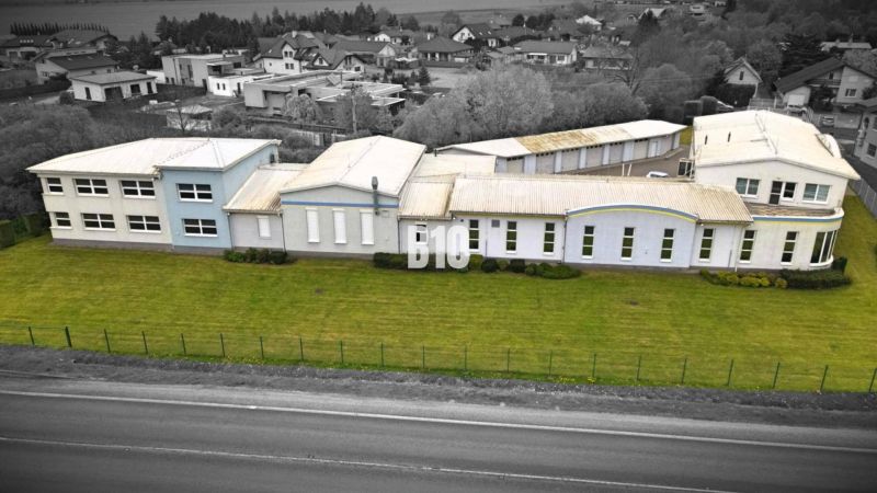 Production premises in Košťany nad Turcom with a spacious green area in the industrial zone.
