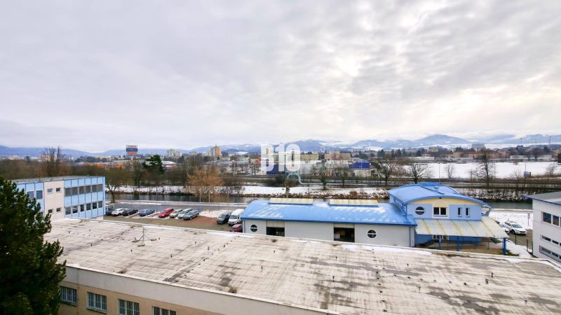 A view of the winter scenery of the city of Martin from Timravy Street with industrial buildings.