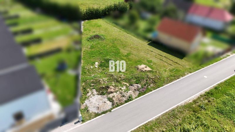 Residential plots in Diaková, green area by the asphalt road.