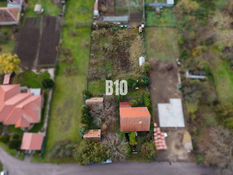A family house in Vlkas with a large plot and a red roof in a quiet location.