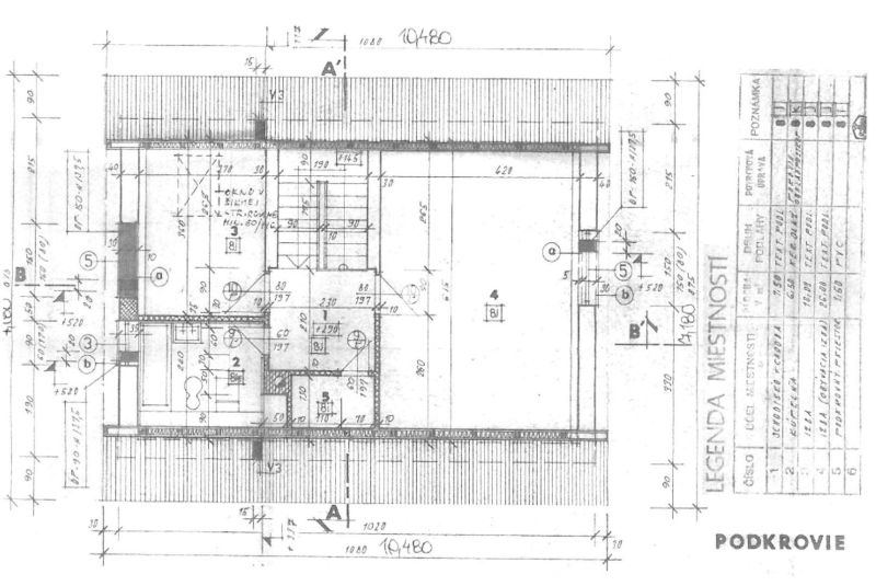 Attic floor plan of a family house with room details and dimensions.