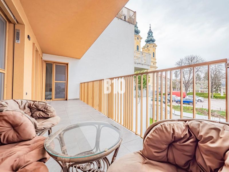 The balcony of the 3-room apartment in Nitra offers a view of the city center.