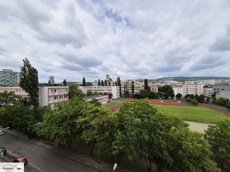 A view of the school and sports field on Jelačičova Street in Bratislava - Ružinov.