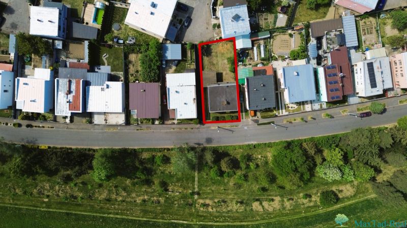 Family house on Nábrežie J. M. Hurbana in Michalovce with adjacent land.