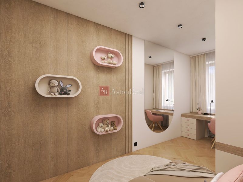 A children's room in a two-room apartment with wooden decor and shelves on the wall.