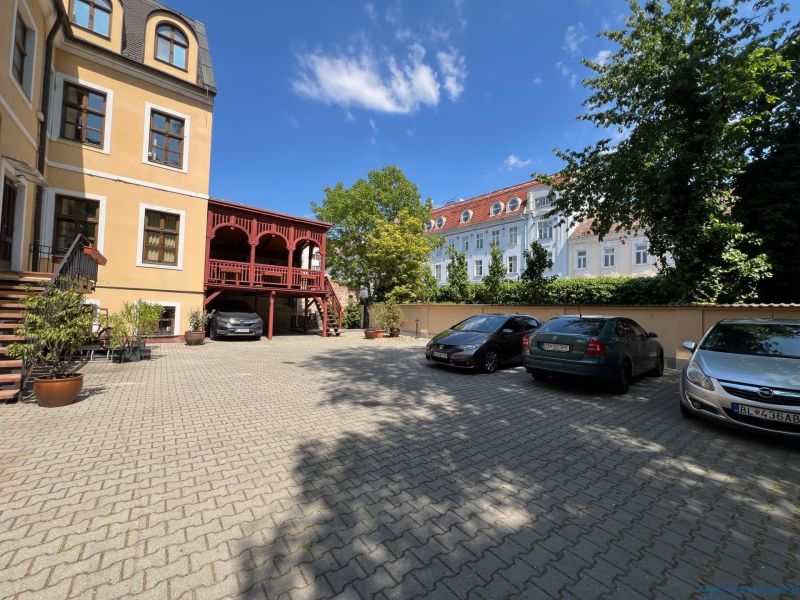 Parking lot at the offices on Grösslingova Street in Bratislava - Old Town with cars.