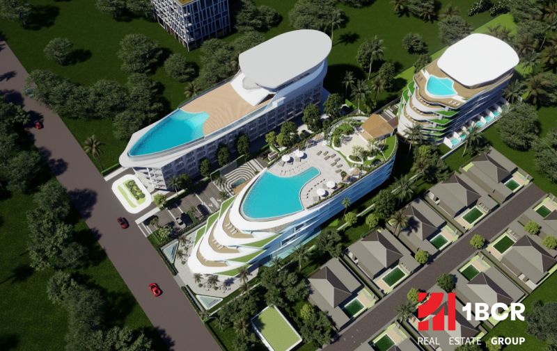 Visualization of apartment construction in Phuket: multi-story buildings with pools surrounded by greenery and a road.
