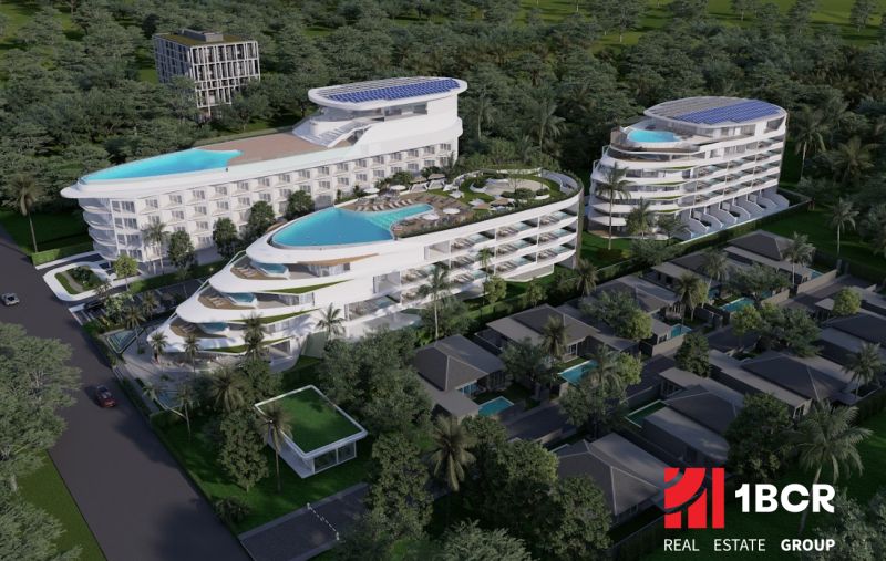 Apartment construction in Phuket with a wavy design and rooftop pools set in greenery.