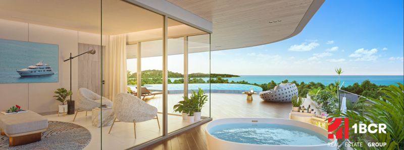 Elegant interior with a view of the terrace, pool, and ocean, Apartment construction.