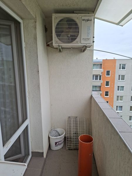 A balcony with air conditioning in a 2-room apartment on T. Vansovej Street in Nové Zámky.