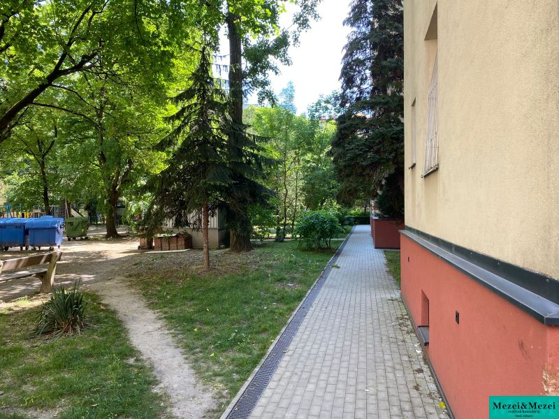 A peaceful environment with a walkway and greenery near Legionárska Street in Bratislava.