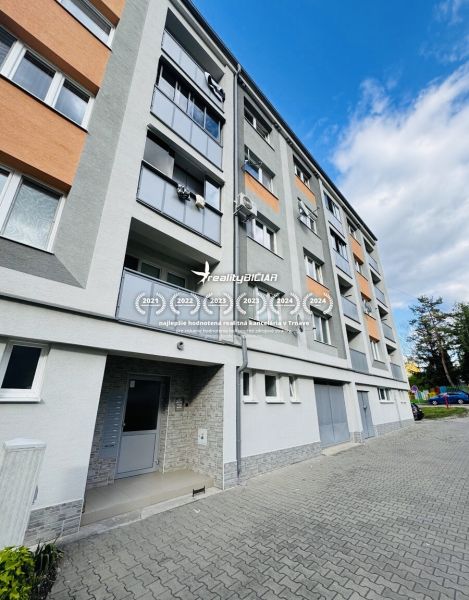 Apartment building with a 3-room apartment on Za poštou Street in Hlohovec.