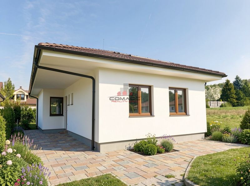 A family house on Pánska Niva in Hlohovec with a stone pathway and a well-maintained garden.