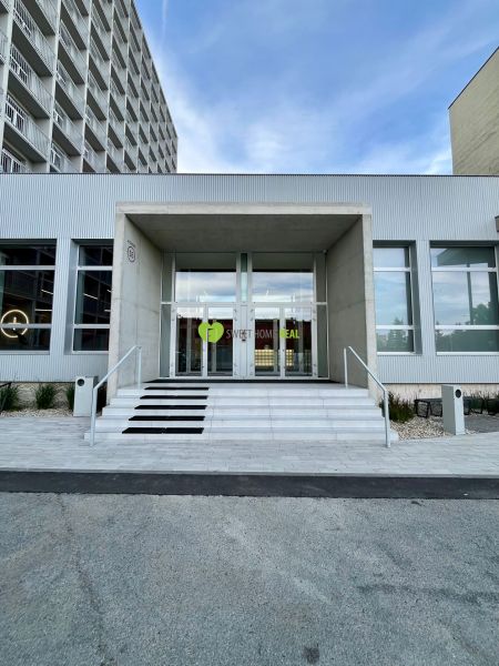 The exterior of the building on Kysucká Street in Košice, Západ district, with a staircase in front.