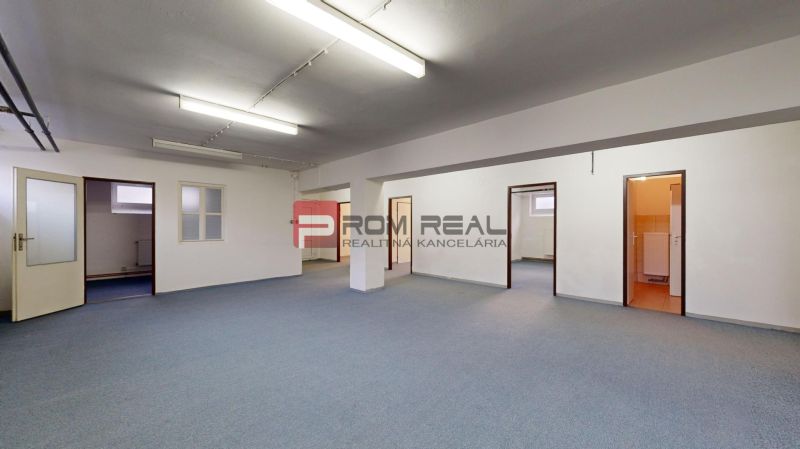 Interior space with offices and blue carpet in warehouses and halls.