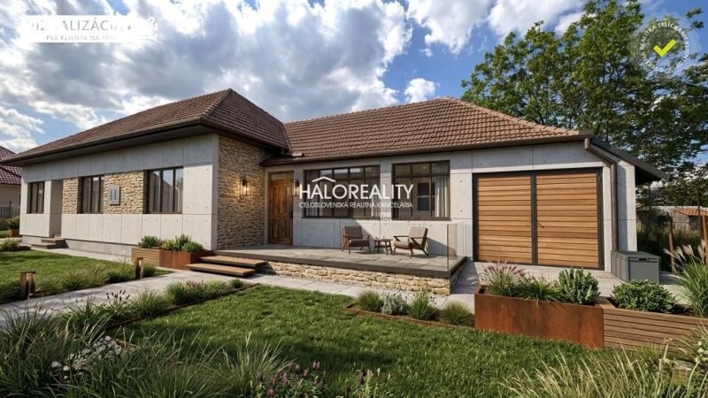 A family house in Lok with a terrace, stone facade, and grassed garden.