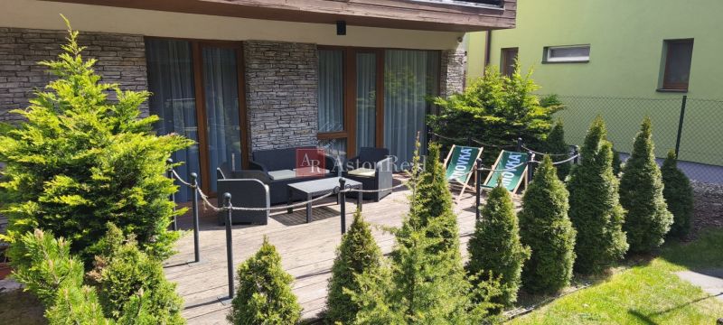 In the recreational apartment in Demänová on Demänová Street, there is a terrace with comfortable seating.