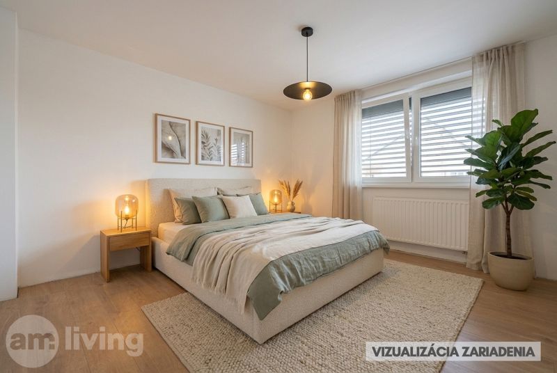 Bedroom in a family house with green accents and wood-patterned flooring.