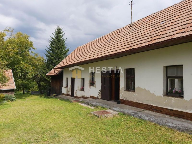 A family house in Cerová surrounded by greenery, suitable for residential land.