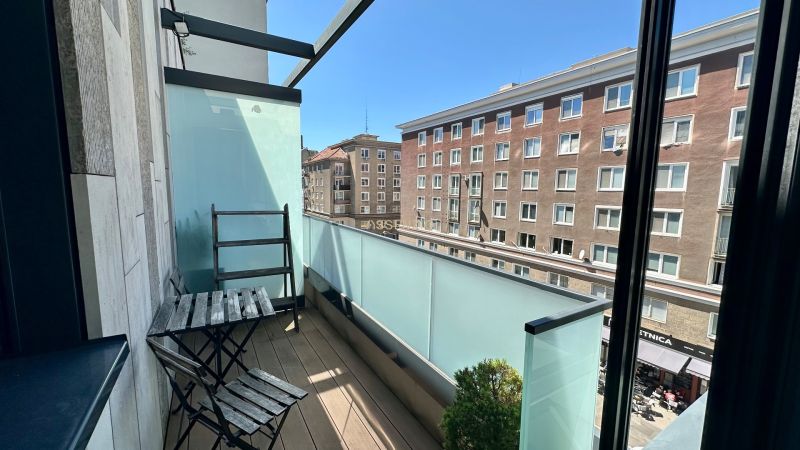 The balcony of a 2-room apartment on Mýtna in Bratislava with a view of the City House.