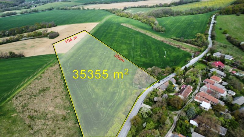 Aerial view of agricultural and forest land in Prašník on Grnča Street.