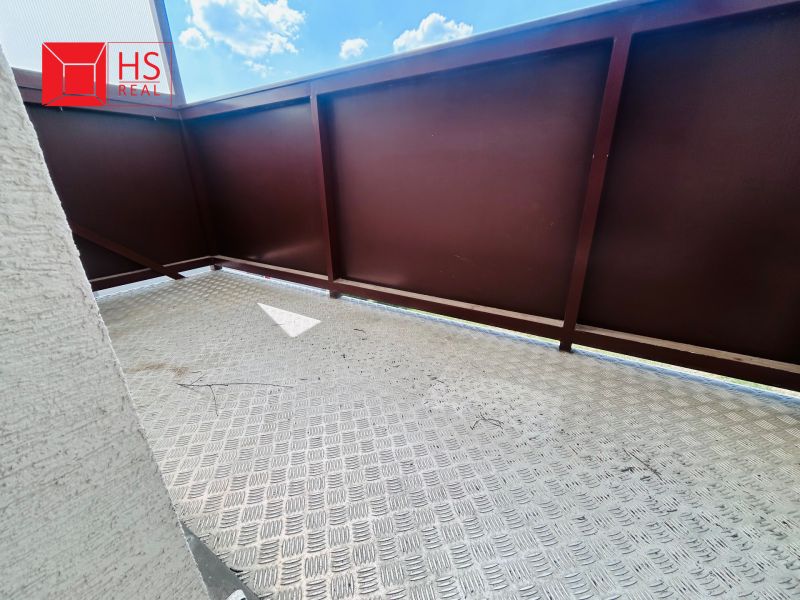 A balcony in a 3-room apartment on G. Bethlen Street in Nové Zámky with a metal floor.