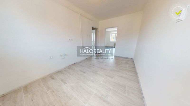 Expected interior of a 2-room apartment with a wooden decor floor.